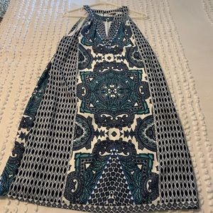 Like new dress halter style. Perfect dress for the summer:) Smoke free home ..